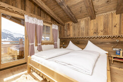 Hütte_Alpenherz_schlafzimmer_wiedersbergerhorn