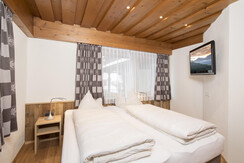 Familiensuite Tirol Schlafzimmer
