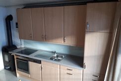 Küche mit gemütlichen Holzofen