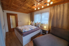 Appartement Tirol sleeproom with cosy couch