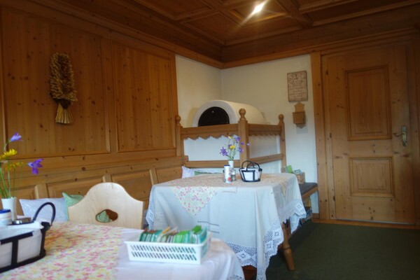 Frühstücksraum Kachelofen | © Haus Postfeld